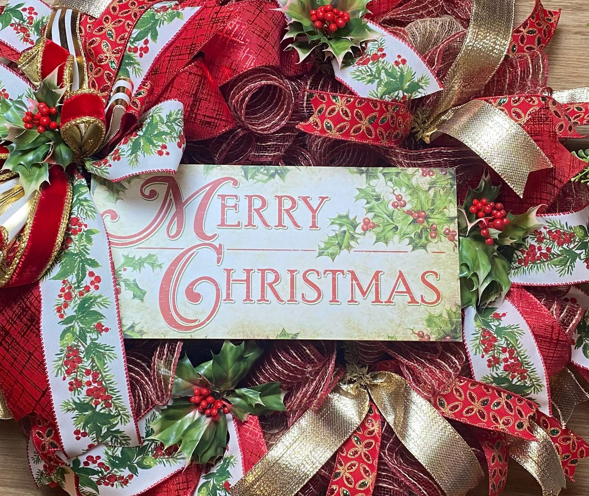 Elegant Gold and Red Nativity Wreath with Holly Berry Embellishments