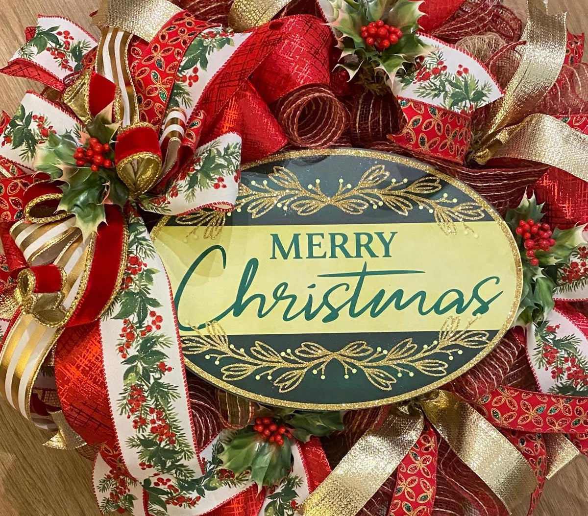 Elegant Gold and Red Nativity Wreath with Holly Berry Embellishments